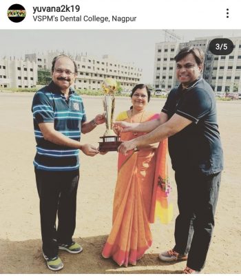 DEAN MA'AM WITH DENTAL PREMIER LEAGUE TROPHY